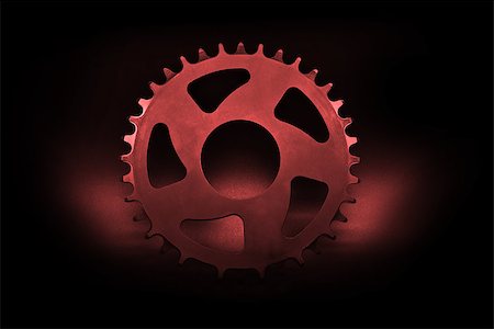 simsearch:400-09089843,k - Red bicycle chainring on a black background. Stock Photo - Budget Royalty-Free & Subscription, Code: 400-08333838