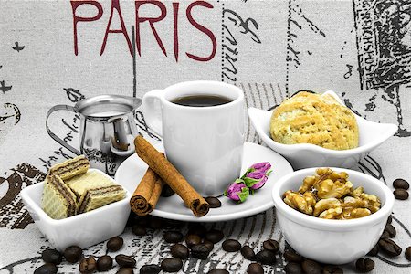 Coffee still life with coffee, coffee beans, cinnamon and desserts. Stock Photo - Budget Royalty-Free & Subscription, Code: 400-08333830