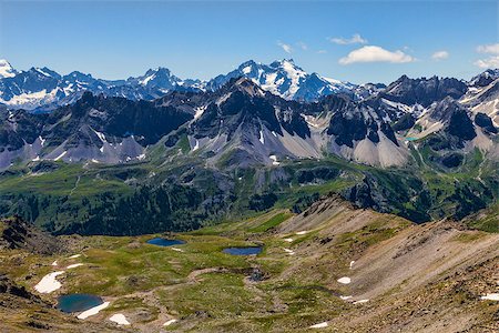 View of the Ecrins Massiff in the background with the small Lakes Gradioles in the first plane on Claree Valley in Haute Alpes, Nevache. Photographie de stock - Aubaine LD & Abonnement, Code: 400-08333907
