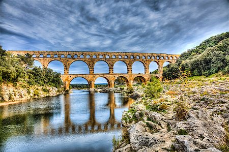 Pont du Gard is an old Roman aqueduct near Nimes in Southern France. Photographie de stock - Aubaine LD & Abonnement, Code: 400-08333911