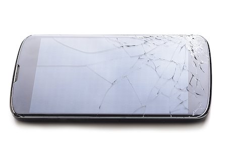 modern smartphone with cracked screen in one corner, isolated on white background Stock Photo - Budget Royalty-Free & Subscription, Code: 400-08333950