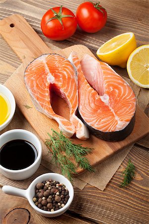 simsearch:400-08187570,k - Salmon, spices and condiments on wooden table. Top view Stockbilder - Microstock & Abonnement, Bildnummer: 400-08344222