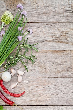 Fresh herbs and spices on wooden table. Top view with copy space Stock Photo - Budget Royalty-Free & Subscription, Code: 400-08344245