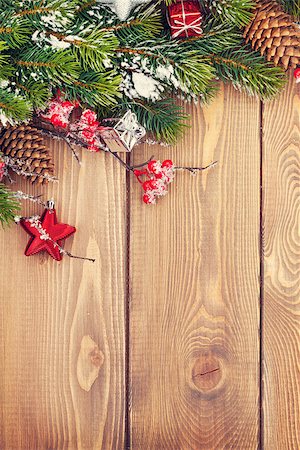 simsearch:400-07824858,k - Christmas wooden background with snow fir tree and decor Stock Photo - Budget Royalty-Free & Subscription, Code: 400-08346931