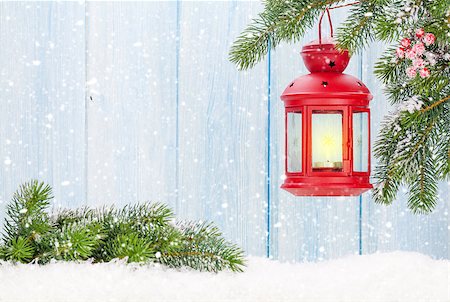 Christmas candle lantern on fir tree branch in snow. View with copy space Stock Photo - Budget Royalty-Free & Subscription, Code: 400-08346972