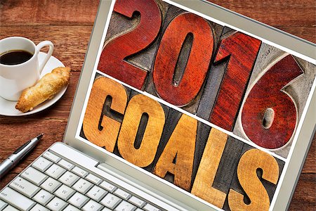 simsearch:400-08335158,k - 2016 goals - New Year resolution concept - isolated text in vintage letterpress wood type printing blocks on a laptop screen with a cup of coffee Photographie de stock - Aubaine LD & Abonnement, Code: 400-08340175