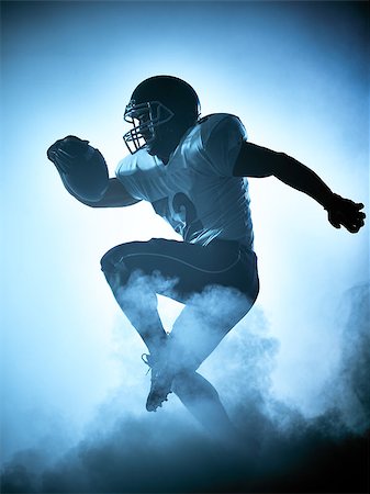 simsearch:400-08787080,k - one american football player portrait in silhouette shadow on white background Foto de stock - Super Valor sin royalties y Suscripción, Código: 400-08340383