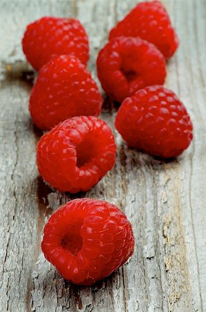 simsearch:400-08020671,k - Arrangement of Perfect Ripe Raspberries closeup on Rustic Wooden background Stock Photo - Budget Royalty-Free & Subscription, Code: 400-08340855