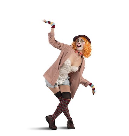 Colorful clown woman in a extravagant pose Photographie de stock - Aubaine LD & Abonnement, Code: 400-08340997