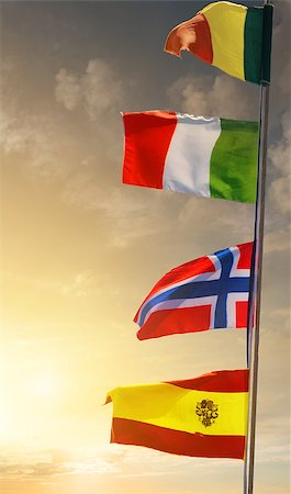 Mast with flags of different countries at sunset Stock Photo - Budget Royalty-Free & Subscription, Code: 400-08341702