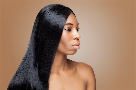 simsearch:400-06179308,k - Beautiful young black woman with long straight hair Stock Photo - Budget Royalty-Free & Subscription, Code: 400-08342119