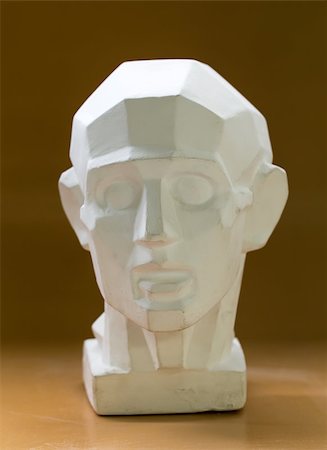 Tutorial primitive plaster head model. Front view. Located against wall as a background. Stockbilder - Microstock & Abonnement, Bildnummer: 400-08342126