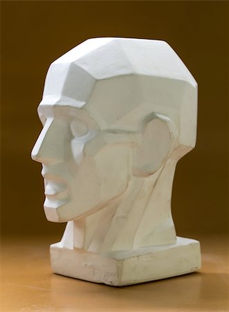 Tutorial primitive plaster head model. Side view. Located against wall as a background. Stockbilder - Microstock & Abonnement, Bildnummer: 400-08342127
