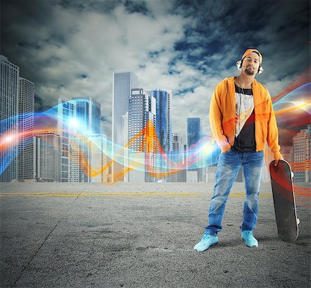 Boy with skateboard on a city background Stockbilder - Microstock & Abonnement, Bildnummer: 400-08342427