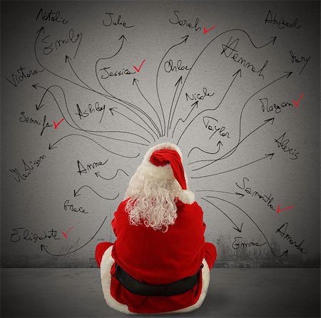 simsearch:640-02953413,k - Santaclaus with name list in the wall Stockbilder - Microstock & Abonnement, Bildnummer: 400-08342691