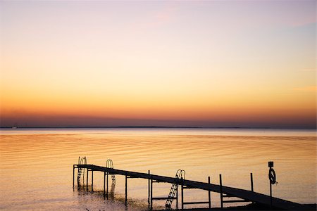 simsearch:400-09136289,k - Magical colors at sunset by a bath pier in the Baltic Sea Photographie de stock - Aubaine LD & Abonnement, Code: 400-08343237