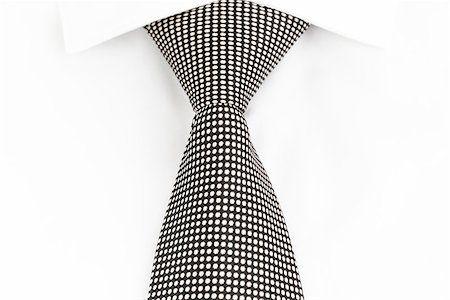 black and white spotted tie knotted Windsor, front view Stockbilder - Microstock & Abonnement, Bildnummer: 400-08343812