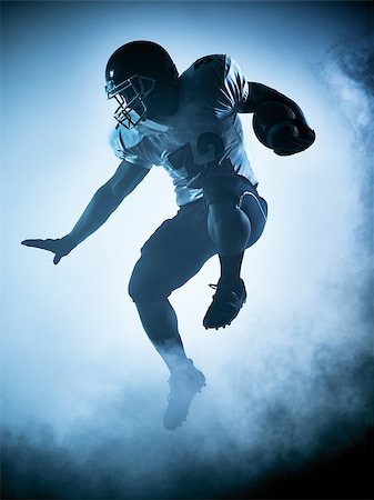 one american football player portrait in silhouette shadow on white background Foto de stock - Super Valor sin royalties y Suscripción, Código: 400-08343887