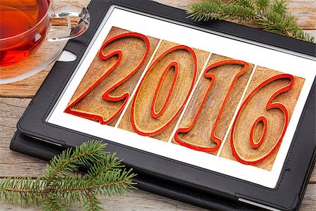 simsearch:400-08332628,k - 2016 year  in outlined letterpress wood type blocks stained by red ink  -  New Year concept on a digital tablet Foto de stock - Super Valor sin royalties y Suscripción, Código: 400-08343968
