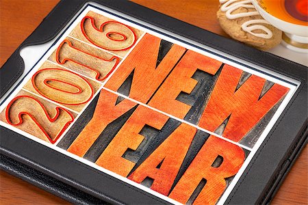 simsearch:400-08332628,k - 2016 New Year greeting card - word abstract in outlined letterpress wood type blocks stained by red ink on a digital tablet Foto de stock - Super Valor sin royalties y Suscripción, Código: 400-08343969