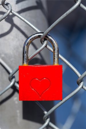 Red heart lock with a fence. Stock Photo - Budget Royalty-Free & Subscription, Code: 400-08374254