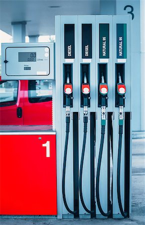 Fuel guns at gas station with petrol and diesel fuel for automobile transport Fotografie stock - Microstock e Abbonamento, Codice: 400-08374999