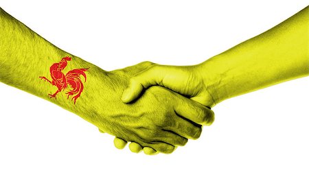 Man and woman shaking hands, wrapped in flag pattern, Wallonia Foto de stock - Super Valor sin royalties y Suscripción, Código: 400-08375406