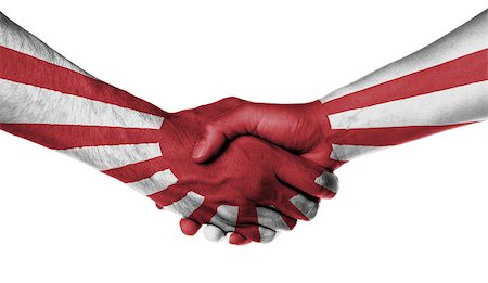 Man and woman shaking hands, wrapped in flag pattern, Japan Stock Photo - Budget Royalty-Free & Subscription, Code: 400-08375402