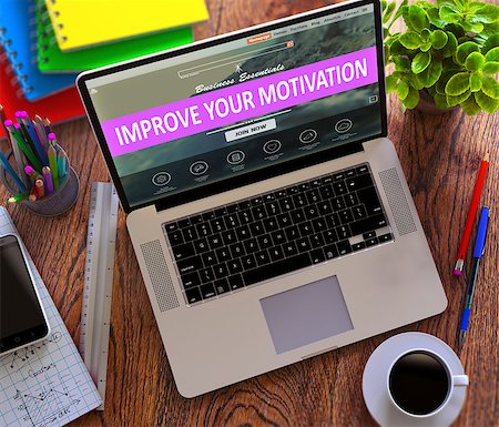 Improve Your Motivation  Concept. Modern Laptop and Different Office Supply on Wooden Desktop background. Stock Photo - Budget Royalty-Free & Subscription, Code: 400-08376049