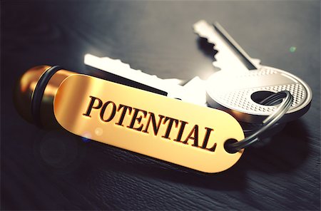 simsearch:400-07338798,k - Potential - Bunch of Keys with Text on Golden Keychain. Black Wooden Background. Closeup View with Selective Focus. 3D Illustration. Toned Image. Stock Photo - Budget Royalty-Free & Subscription, Code: 400-08376040