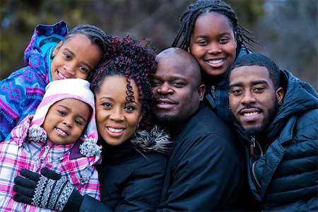 simsearch:695-05773921,k - casual winter young black family outdoors in the park Photographie de stock - Aubaine LD & Abonnement, Code: 400-08377004