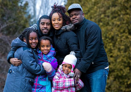 simsearch:695-05773921,k - casual winter young black family outdoors in the park Photographie de stock - Aubaine LD & Abonnement, Code: 400-08377002