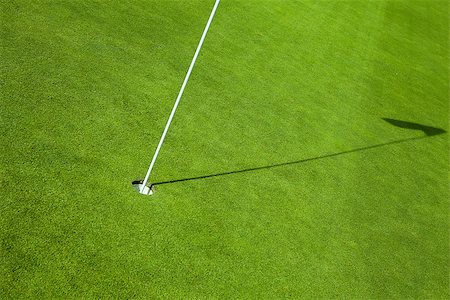 simsearch:400-03975619,k - white golf flag in green hole Stock Photo - Budget Royalty-Free & Subscription, Code: 400-08377509