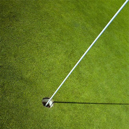 simsearch:400-03975619,k - white golf flag in green hole Stock Photo - Budget Royalty-Free & Subscription, Code: 400-08377511