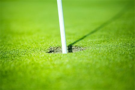 simsearch:400-03975619,k - sport golf hole on green Stock Photo - Budget Royalty-Free & Subscription, Code: 400-08377512