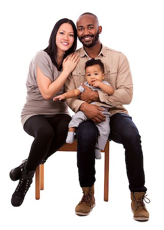simsearch:695-05773921,k - casual young mixed family on white isolated background Photographie de stock - Aubaine LD & Abonnement, Code: 400-08377767