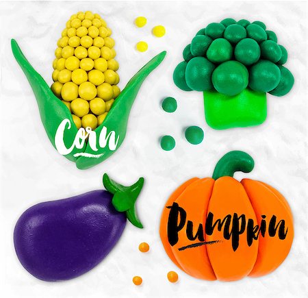 pumpkin home garden - Plasticine modeling vegetables pumpkin corn  broccoli eggplant cobbled together on a white plasticine background Stock Photo - Budget Royalty-Free & Subscription, Code: 400-08378464