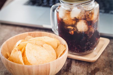 Crispy potato chips with iced cola, stock photo Stock Photo - Budget Royalty-Free & Subscription, Code: 400-08370481