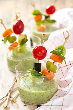 Vegetable sticks and green cold soup (gazpacho) . Foto de stock - Super Valor sin royalties y Suscripción, Código: 400-08371526