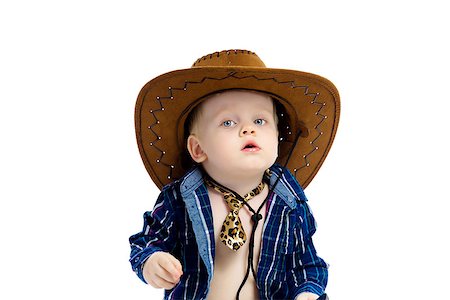 Little boy in cowboy hat and tie. White background. Studio Foto de stock - Super Valor sin royalties y Suscripción, Código: 400-08371551