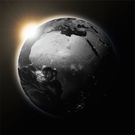 simsearch:859-08384610,k - Sun over Africa on dark planet Earth isolated on black background. Highly detailed planet surface. Elements of this image furnished by NASA. Stock Photo - Budget Royalty-Free & Subscription, Code: 400-08371796