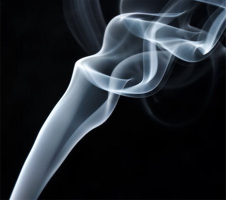 simsearch:400-07329912,k - Abstract smoke swirls over black background. Studio shot. Photographie de stock - Aubaine LD & Abonnement, Code: 400-08371875