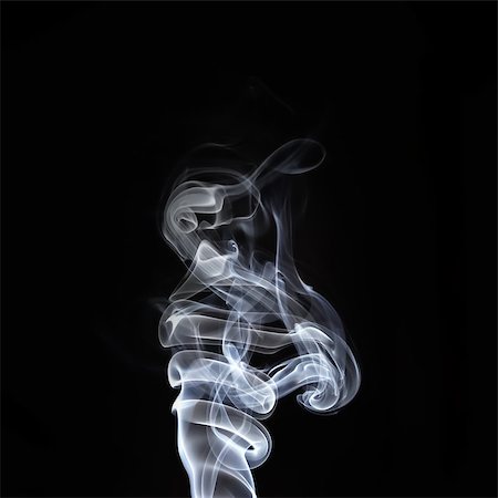 simsearch:400-07329912,k - Swirls of smoke on a black background. Studio shot. Photographie de stock - Aubaine LD & Abonnement, Code: 400-08371872