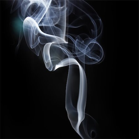 simsearch:400-07329912,k - Abstract smoke swirls over black background. Studio shot. Photographie de stock - Aubaine LD & Abonnement, Code: 400-08371873