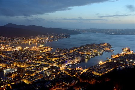 simsearch:400-06692838,k - Top view of Bergen (the west coast of Norway) in night. The town is illuminated. Blue sky and sea are in the background. Stockbilder - Microstock & Abonnement, Bildnummer: 400-08371917