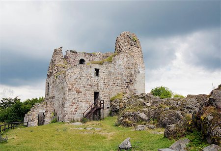 simsearch:400-06736198,k - Primda castle - the one from the oldest stone castles in Czech republic. The first mention of Primda castle dates from the year 1121. The ruins of the castle Primda stands at the southern end of the rocky ridge above the Primda village on Tachov Region. Primda is considered to be the oldest surviving stone castle in Bohemia and is protected as a national monument. The castle has been preserved rui Stock Photo - Budget Royalty-Free & Subscription, Code: 400-08372034