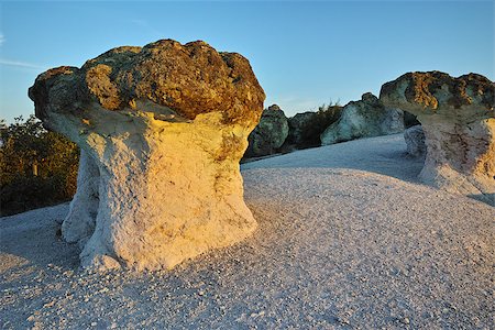 prodigio - Sunrise at a rock phenomenon The Stone Mushrooms near Beli plast village, Kardzhali Region, Bulgaria Fotografie stock - Microstock e Abbonamento, Codice: 400-08372040