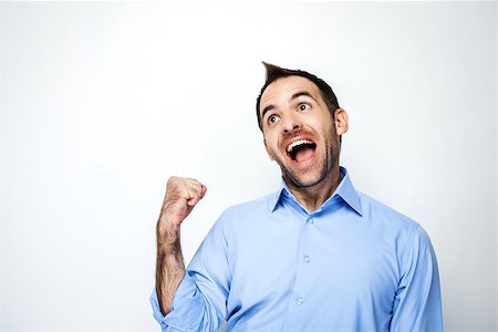 funny office mad - Funny photo of businessman with beard wearing shirt. Businessman cheerfully smiling and rejoicing success. Isolated on white background Stock Photo - Budget Royalty-Free & Subscription, Code: 400-08372798