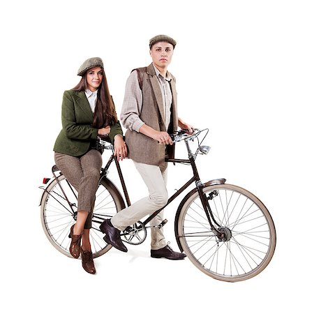 simsearch:400-06951810,k - Vintage dressed couple sitting on retro bike Stock Photo - Budget Royalty-Free & Subscription, Code: 400-08372944
