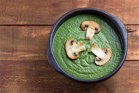 simsearch:400-07298426,k - vegetarian food spinach soup decorated with mushrooms on the dark wooden table, horizontal. top view Stock Photo - Budget Royalty-Free & Subscription, Code: 400-08373225